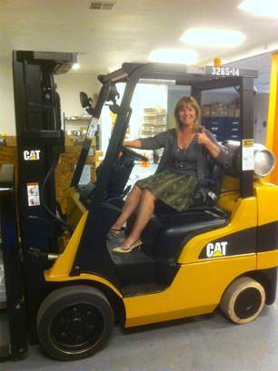 Margee on her new CAT Forklift